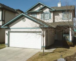 4 bdrm house in country hills // great rental investment